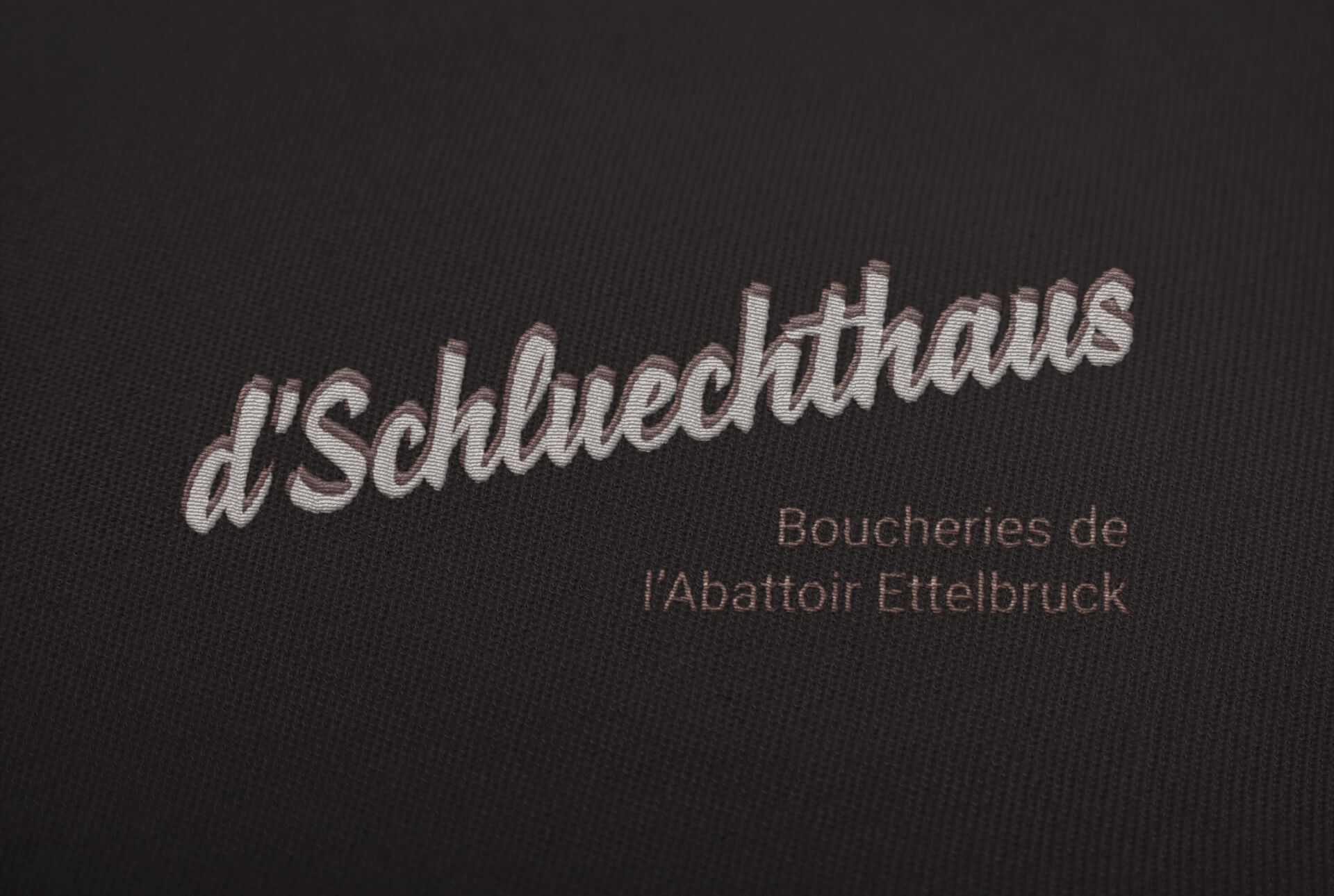 Logotype des boucheries d’Schluechthaus, brodé sur un textile