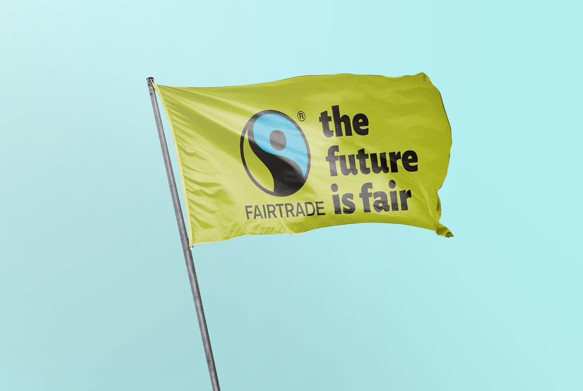 Drapeau comprenant le logo et la nouvelle devise de l'ASBL Fairtrade
